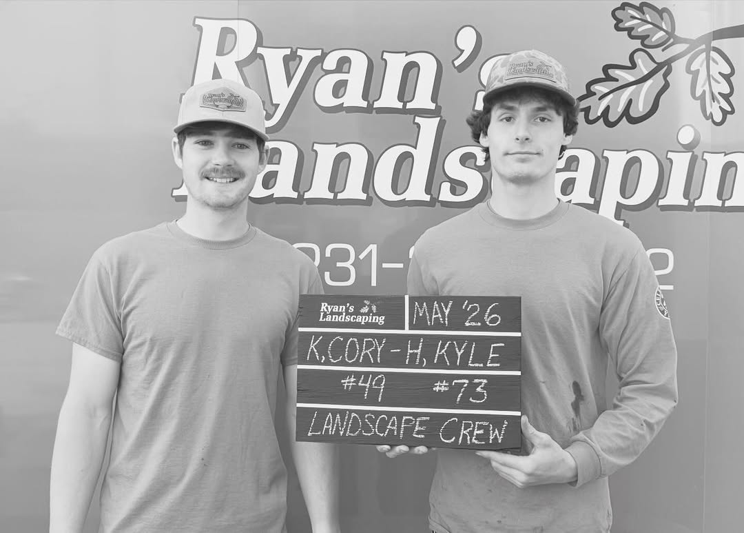 Cory and Kyle, employees of the month, shoreline boulder work